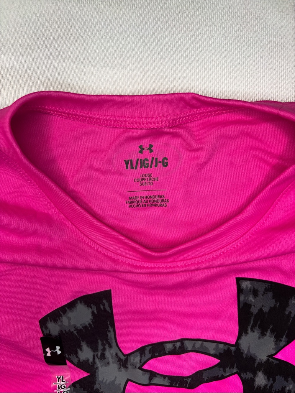 Under Armour Women's Bright Pink Crew Neck Short Sleeve Tee with Black Logo - Picture 3 of 4